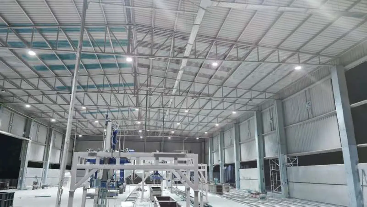 Interior of the Al Watba Cement Factory hall with installed equipment