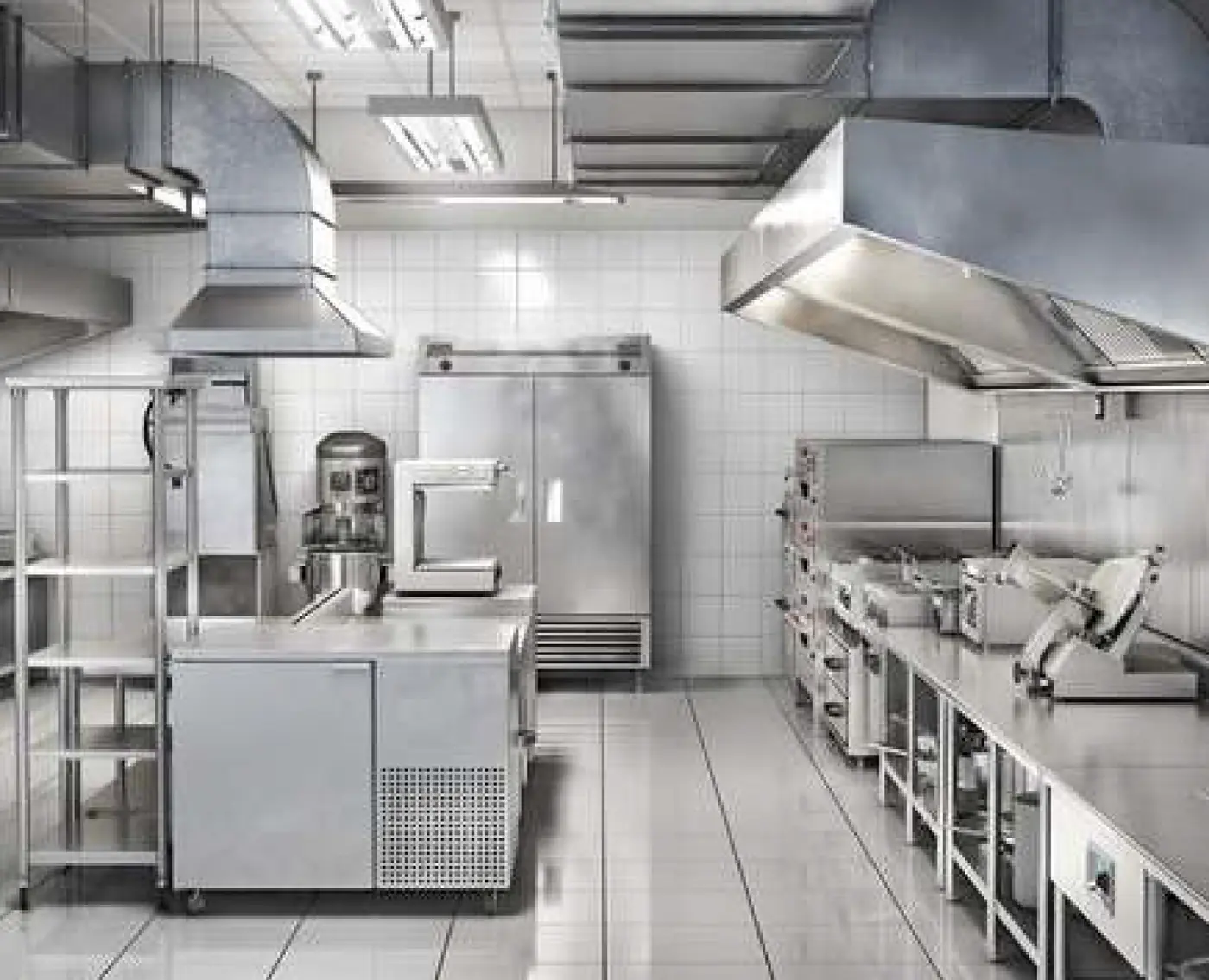 Stainless steel commercial kitchen with extraction hood at Bajee Restaurant