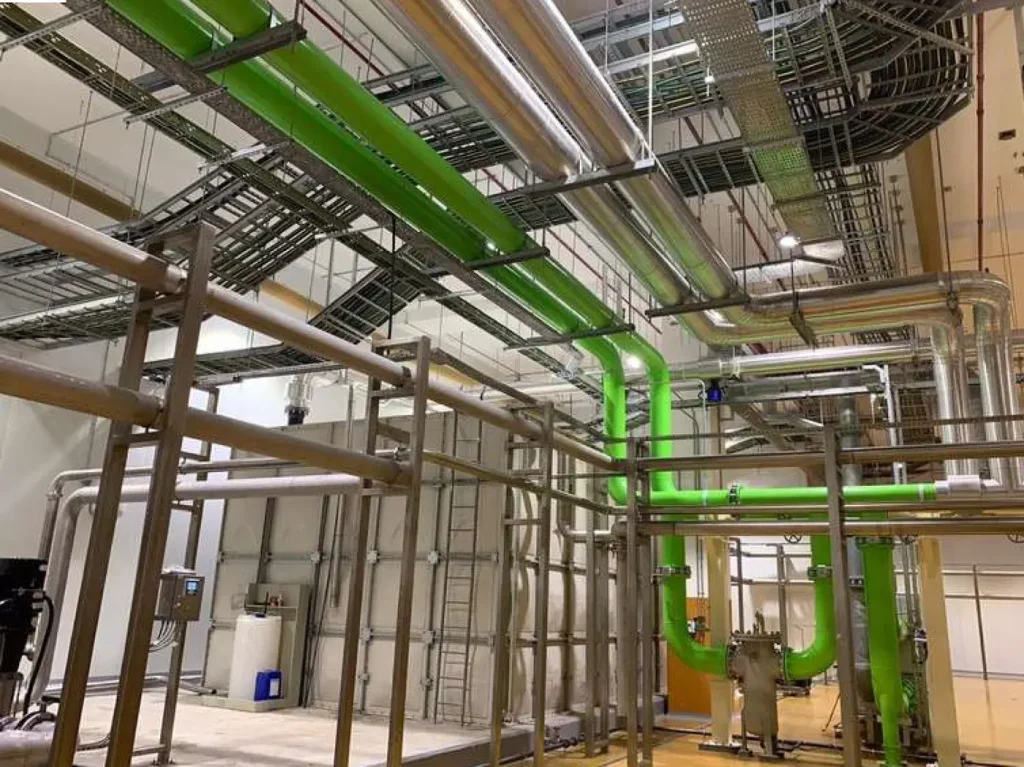 Colour-coded water, steam and air piping networks at the NFPC mini plant